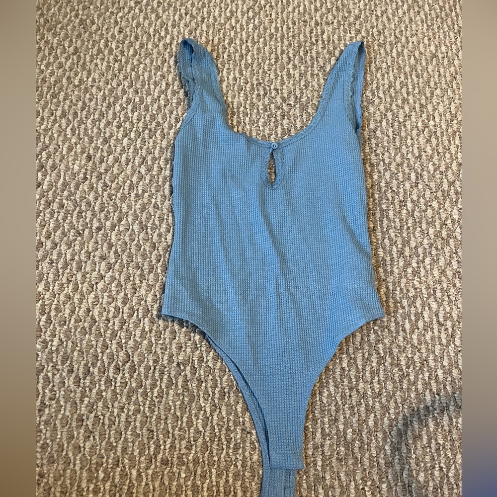 Blue body suit